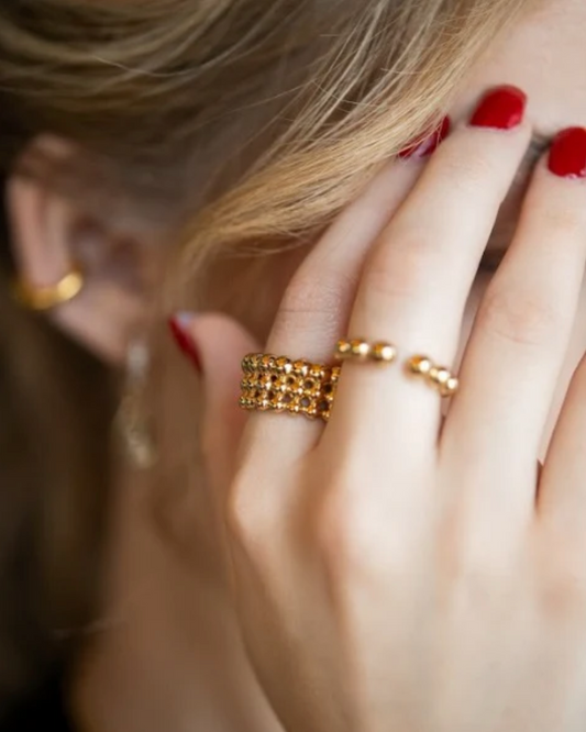 Anillo Bolitas Triple Dorado