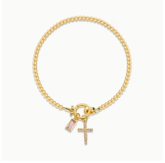 Pulsera cruz con dije