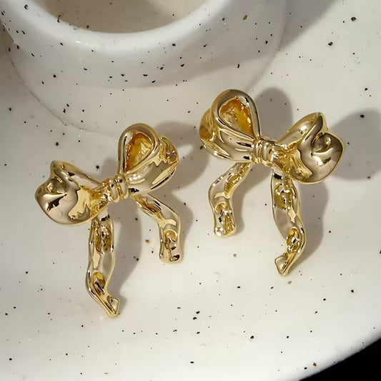 Aretes Moño